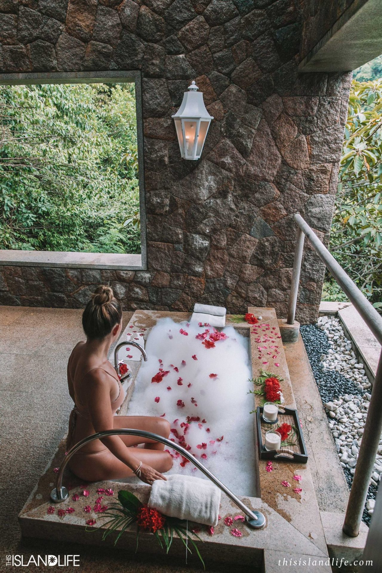 Girl in bath at Four Seasons Resort Seychelles spa